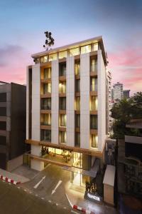 a rendering of a hotel in the city at The Quarter Phromphong by UHG - SHA Extra Plus in Bangkok