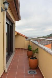 Uma varanda ou terraço em Ático con vistas al mar