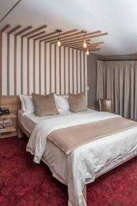 LOCH LOGAN HOTEL客房内的一张或多张床位