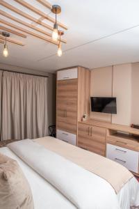 LOCH LOGAN HOTEL客房内的一张或多张床位