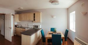 Kuchyňa alebo kuchynka v ubytovaní Atlantic Hotel