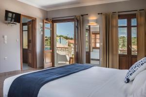 Postel nebo postele na pokoji v ubytování Balhambra Suites - Adults Only + 92 fotografií