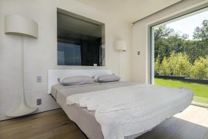 Posteľ alebo postele v izbe v ubytovaní Villa Camilla