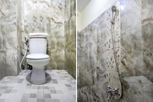 Phòng tắm tại Super OYO 2509 Hotel Tebel 19