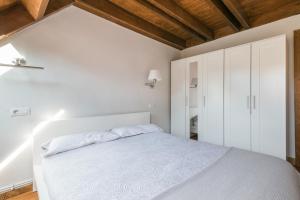 Postel nebo postele na pokoji v ubytování Casa Salient by Totiaran