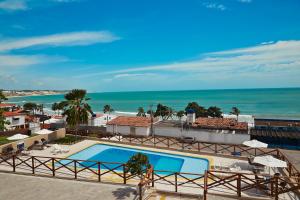 a view of the ocean from the balcony of a resort at El Aram Ponta Negra in Natal +22 photos