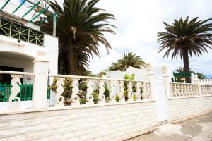 A balcony or terrace at Book Jet - Bungalow Style & Comfort