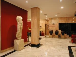 The lobby or reception area at Nova Roma