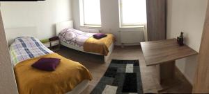 Ein Bett oder Betten in einem Zimmer der Unterkunft Zimmervervietung Bei Lachajczyk
