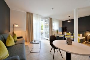 Ein Sitzbereich in der Unterkunft Hotel- & Ferienanlage Kapitäns-Häuser Breege