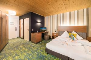 Postel nebo postele na pokoji v ubytování Hotel die Hindenburg