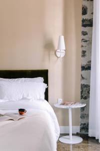 Posteľ alebo postele v izbe v ubytovaní Maison Sainte-Thérèse By Maisons & co