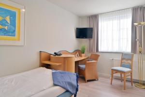 TV/Unterhaltungsangebot in der Unterkunft Hotel- & Ferienanlage Kapitäns-Häuser Breege