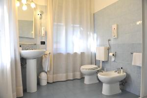 Koupelna v ubytování Albergo Birra + 37 fotografií