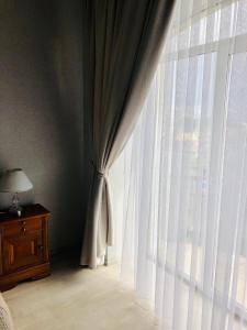 Postel nebo postele na pokoji v ubytování Hotel Palace Ukraine