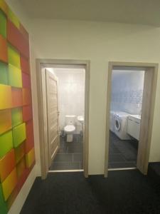 Koupelna v ubytování WELLNESS APARTMÁN KAROLÍNA