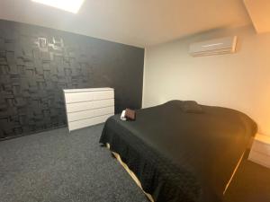 Postel nebo postele na pokoji v ubytování WELLNESS APARTMÁN KAROLÍNA