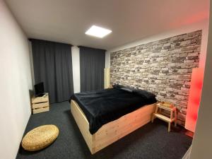 Postel nebo postele na pokoji v ubytování WELLNESS APARTMÁN KAROLÍNA