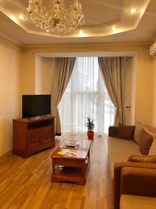 TV a/nebo společenská místnost v ubytování Hotel Palace Ukraine