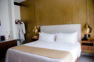 Katil atau katil-katil dalam bilik di IT Boutique Hotel & Restaurant
