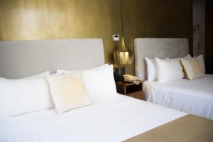 Katil atau katil-katil dalam bilik di IT Boutique Hotel & Restaurant