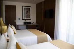 Televisyen dan/atau pusat hiburan di IT Boutique Hotel & Restaurant