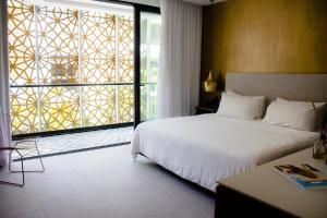 Katil atau katil-katil dalam bilik di IT Boutique Hotel & Restaurant