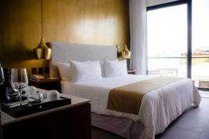 Katil atau katil-katil dalam bilik di IT Boutique Hotel & Restaurant