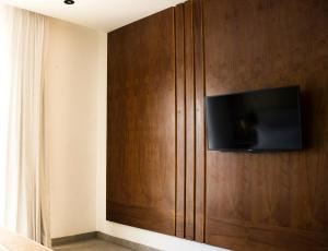 Televisyen dan/atau pusat hiburan di IT Boutique Hotel & Restaurant