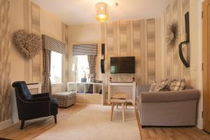 TV a/nebo společenská místnost v ubytování The Lodge House Callander