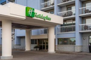 a hospital building with a sign on it at Holiday Inn Kingston - Waterfront, an IHG Hotel in Kingston