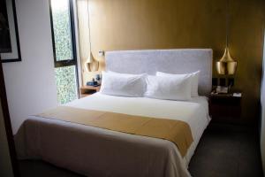 Katil atau katil-katil dalam bilik di IT Boutique Hotel & Restaurant
