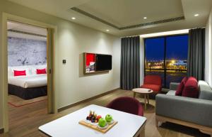 TV a/nebo společenská místnost v ubytování IntercityHotel Nizwa
