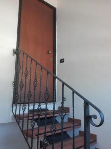 Fotografie z fotogalerie ubytování A La vue chambre BAGNO CONDIVISO SHARED BOTH2piano no lift no navetta a pagamento aria condizionata ed extra bed 3 MINUTI A PIEDI DA BUS PER FIERA DI ROMA v destinaci Fiumicino
