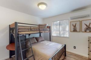 Ένα ή περισσότερα κρεβάτια σε δωμάτιο στο Holiday Chalet