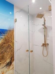 Zdjęcie z galerii obiektu Gold apartament Rewal w Rewalu +2 zdjęcia