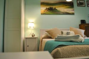 Postel nebo postele na pokoji v ubytování B&B Casa TORET