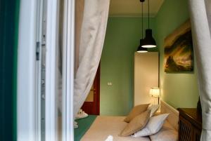 Postel nebo postele na pokoji v ubytování B&B Casa TORET
