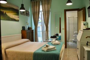 Postel nebo postele na pokoji v ubytování B&B Casa TORET