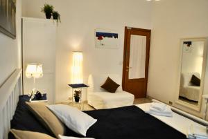 Postel nebo postele na pokoji v ubytování B&B Casa TORET
