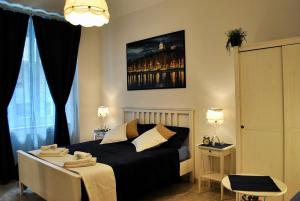Postel nebo postele na pokoji v ubytování B&B Casa TORET