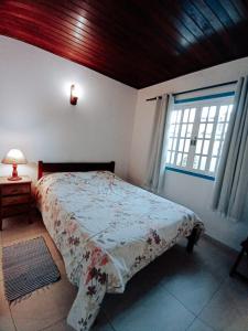 Postel nebo postele na pokoji v ubytování Casa no Centro de Búzios