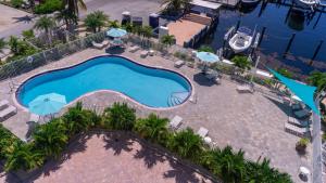 an overhead view of a swimming pool at a resort at Kawama Yacht Club Apartment in Key Largo
