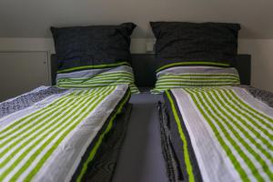 Postel nebo postele na pokoji v ubytování Ferienwohnung in der Mainleite für Zwei