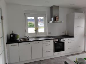 Kuchyň nebo kuchyňský kout v ubytování Ferienwohnung in der Mainleite für Zwei