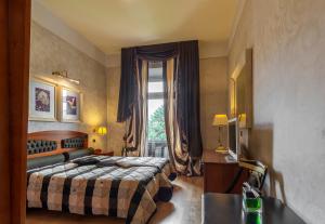 Postel nebo postele na pokoji v ubytování Hotel Columbia Wellness & Spa