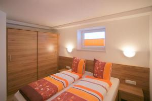 A bed or beds in a room at Mountainpeak