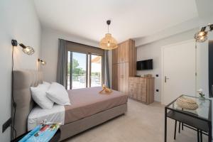 Postel nebo postele na pokoji v ubytování Marianna Villas - Aria - + 25 fotografií