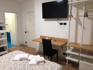 Posteľ alebo postele v izbe v ubytovaní B&B Il Viaggiatore