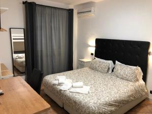 Posteľ alebo postele v izbe v ubytovaní B&B Il Viaggiatore